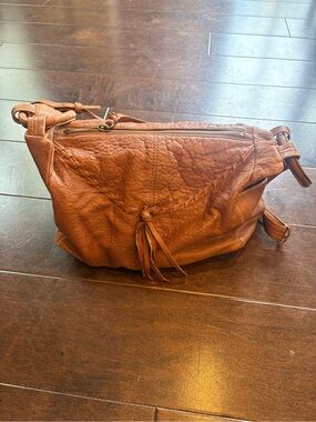 Women's HOBO International Brown Leather Crossbody Bag with Tassel Detail